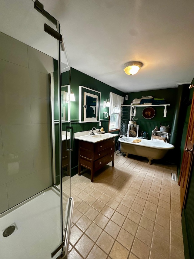 40580 Bow Trl, Nerstrand, MN 55053 - full bathroom featuring vanity, a freestanding bath, tile patterned flooring, and a stall shower
