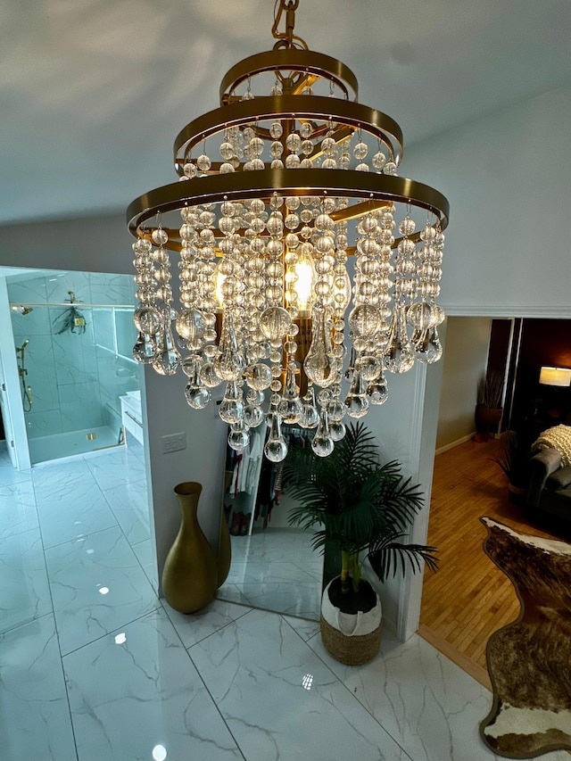 40580 Bow Trl, Nerstrand, MN 55053 - detailed view of a chandelier and baseboards