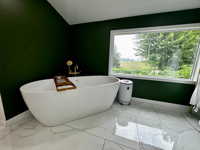 40580 Bow Trl, Nerstrand, MN 55053 - full bath featuring marble finish floors and a soaking tub