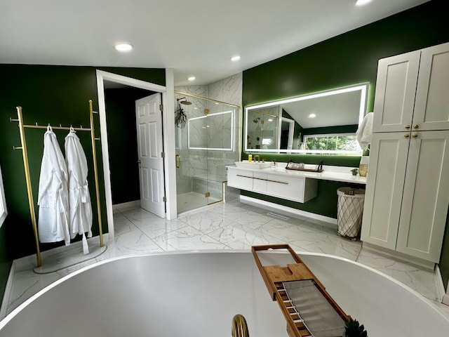 40580 Bow Trl, Nerstrand, MN 55053 - full bath featuring marble finish floors, a shower stall, recessed lighting, vanity, and a freestanding bath