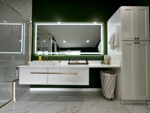 40580 Bow Trl, Nerstrand, MN 55053 - bathroom featuring marble finish floors, a marble finish shower, and double vanity