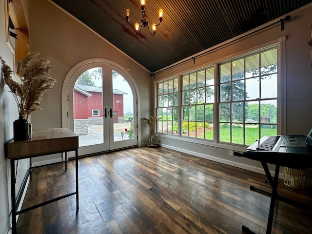 40580 Bow Trl, Nerstrand, MN 55053 - unfurnished sunroom featuring french doors, lofted ceiling, a chandelier, and arched walkways