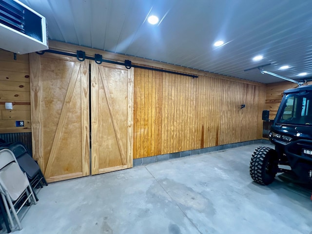 40580 Bow Trl, Nerstrand, MN 55053 - garage featuring wooden walls