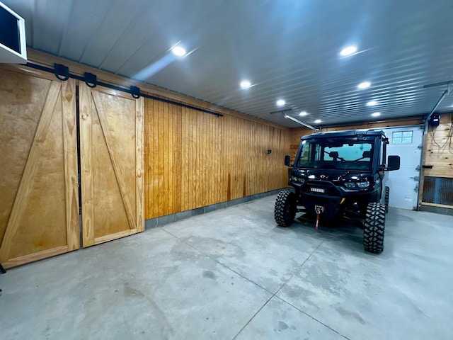 40580 Bow Trl, Nerstrand, MN 55053 - garage with recessed lighting and wooden walls