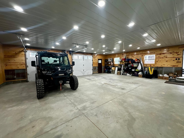 40580 Bow Trl, Nerstrand, MN 55053 - garage with wooden walls and recessed lighting