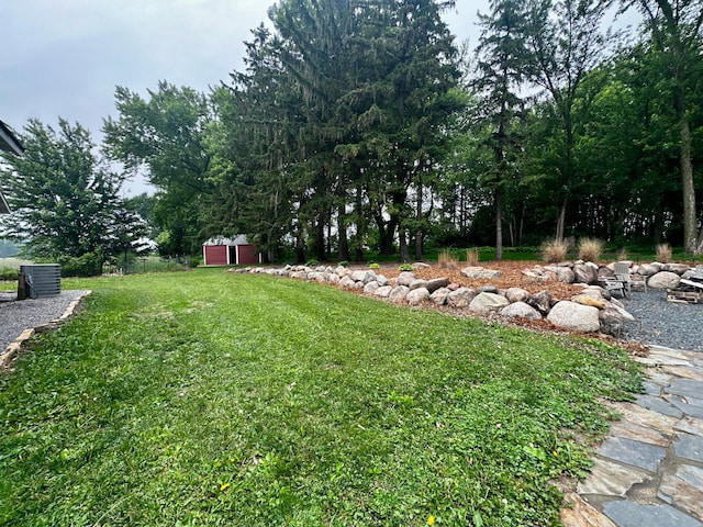 40580 Bow Trl, Nerstrand, MN 55053 - view of green lawn featuring a storage shed