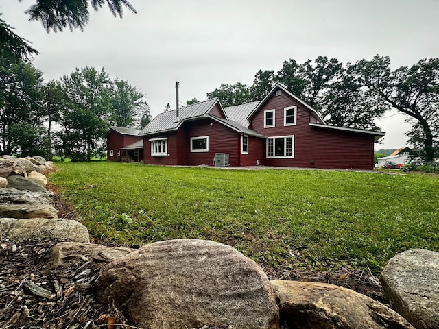 40580 Bow Trl, Nerstrand, MN 55053 - view of property exterior featuring a lawn and a metal roof