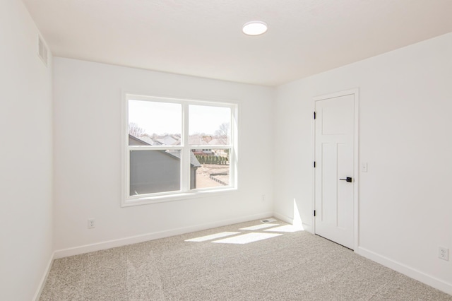 12114 Ivy St, Rogers, MN 55369 - carpeted empty room featuring baseboards