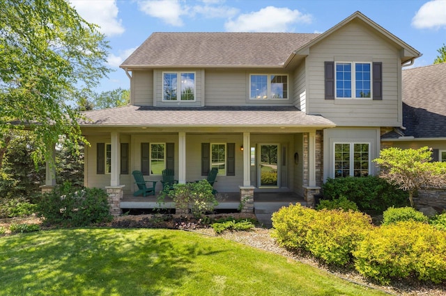 27285 Cambodia Ave, Castle Rock Twp, MN 55024 - view of front of home featuring a shingled roof, a porch, and a front lawn