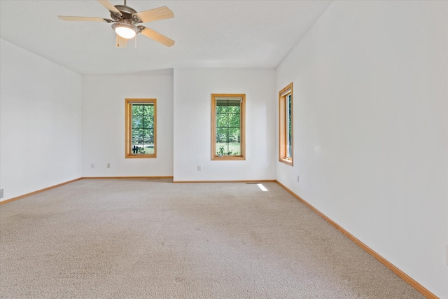 27285 Cambodia Ave, Castle Rock Twp, MN 55024 - carpeted spare room featuring baseboards and a ceiling fan