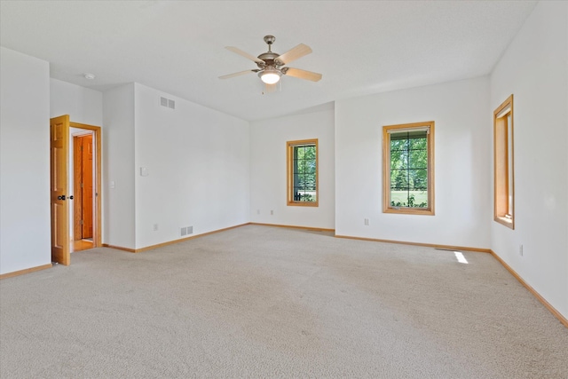 27285 Cambodia Ave, Castle Rock Twp, MN 55024 - empty room featuring light colored carpet, ceiling fan, and baseboards