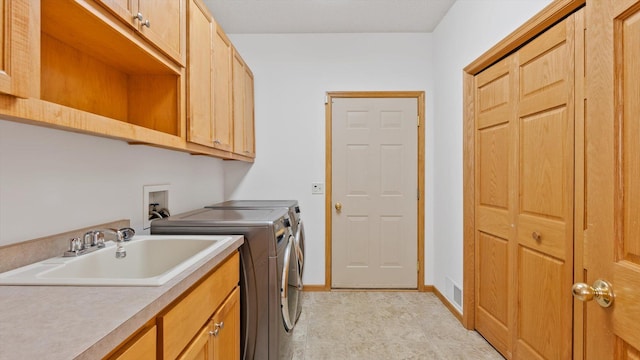 27285 Cambodia Ave, Castle Rock Twp, MN 55024 - laundry room featuring washing machine and dryer, cabinet space, and baseboards