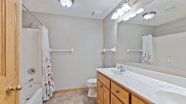 27285 Cambodia Ave, Castle Rock Twp, MN 55024 - full bath with double vanity, toilet, shower / bathtub combination with curtain, baseboards, and a textured ceiling