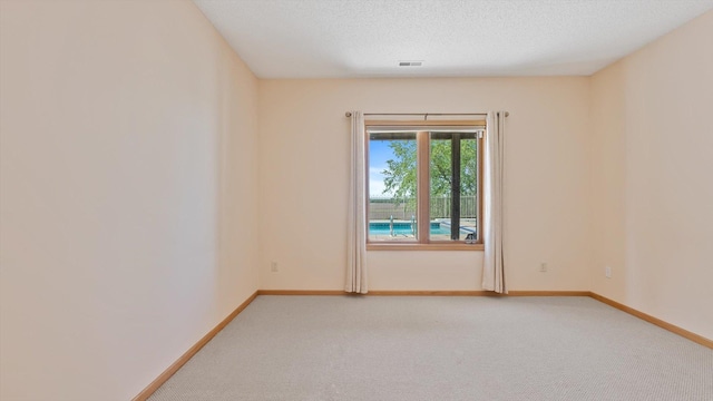 27285 Cambodia Ave, Castle Rock Twp, MN 55024 - spare room featuring baseboards and light carpet