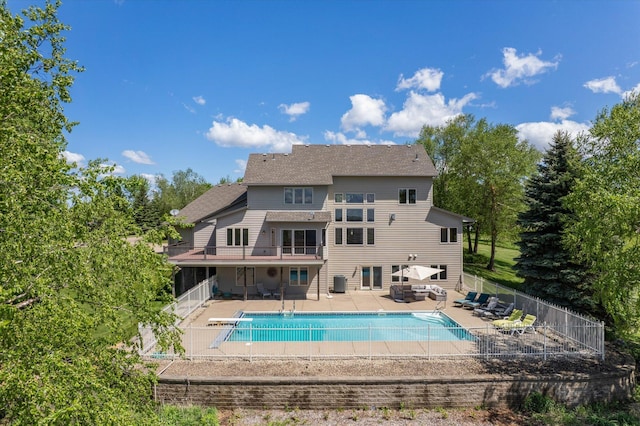 27285 Cambodia Ave, Castle Rock Twp, MN 55024 - view of pool with outdoor lounge area, a patio area, a fenced backyard, and a sunroom