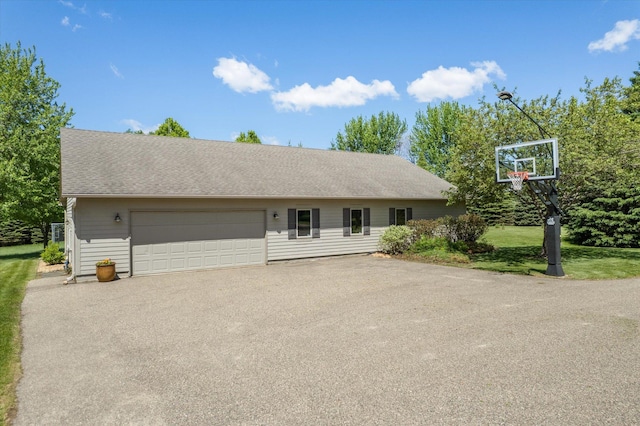 27285 Cambodia Ave, Castle Rock Twp, MN 55024 - view of front of property featuring asphalt driveway, a garage, and a front yard