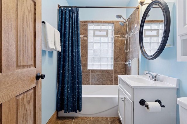 884 Thomas Ave, Saint Paul, MN 55104 - full bathroom with shower / bath combo with shower curtain, vanity, and tile patterned flooring