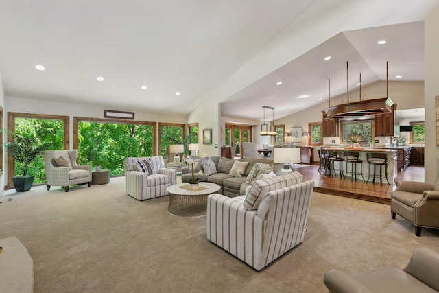 1405 Farm Rd, Chanhassen, MN 55318 - living room featuring lofted ceiling, recessed lighting, and light colored carpet