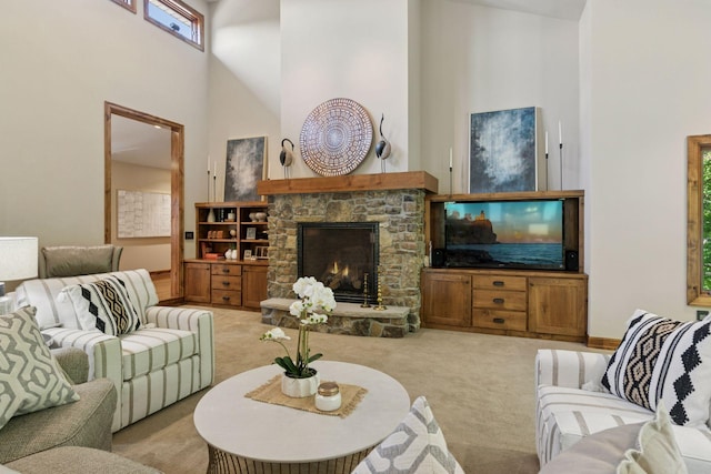1405 Farm Rd, Chanhassen, MN 55318 - living room featuring a high ceiling, carpet, and a fireplace