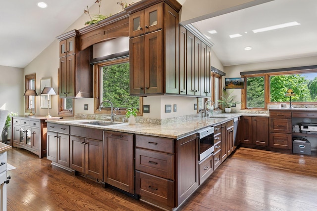 1405 Farm Rd, Chanhassen, MN 55318 - kitchen featuring vaulted ceiling, a sink, light stone countertops, dark wood-style floors, and glass insert cabinets
