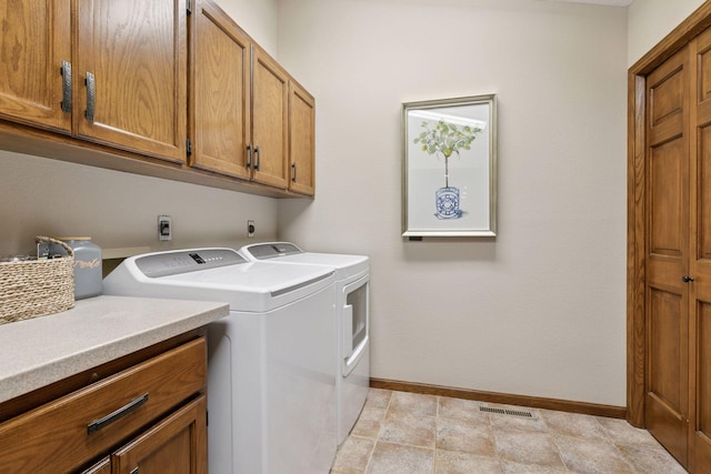 1405 Farm Rd, Chanhassen, MN 55318 - washroom featuring cabinet space, baseboards, and washing machine and dryer