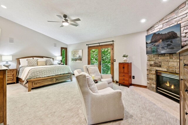 1405 Farm Rd, Chanhassen, MN 55318 - carpeted bedroom featuring lofted ceiling, a fireplace, access to exterior, a ceiling fan, and recessed lighting