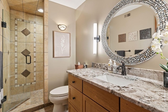 1405 Farm Rd, Chanhassen, MN 55318 - bathroom with toilet, vanity, a shower stall, and tile patterned floors
