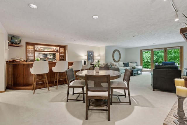 1405 Farm Rd, Chanhassen, MN 55318 - carpeted dining area with wet bar and recessed lighting
