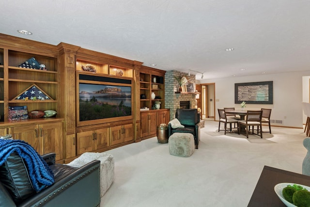 1405 Farm Rd, Chanhassen, MN 55318 - living area with a fireplace, light carpet, recessed lighting, and baseboards