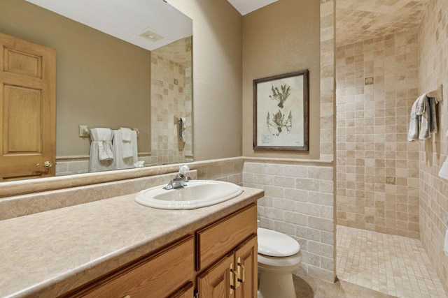 1405 Farm Rd, Chanhassen, MN 55318 - full bathroom featuring toilet, vanity, walk in shower, and tile walls