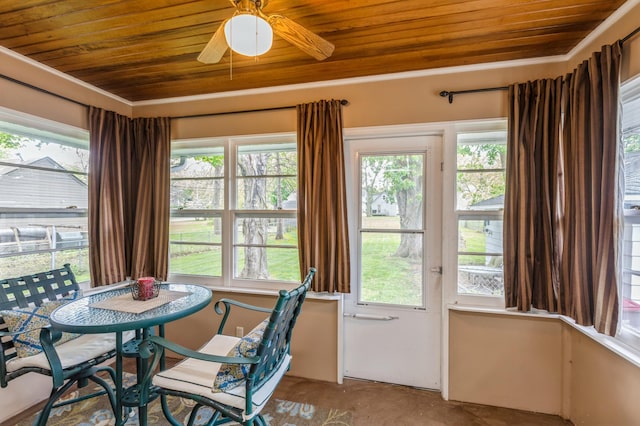 613 9th St NW, Faribault, MN 55021 - dining space featuring wooden ceiling, healthy amount of natural light, a ceiling fan, and unfinished concrete floors