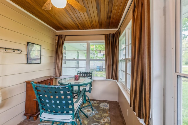 613 9th St NW, Faribault, MN 55021 - sunroom featuring wooden ceiling and wood walls