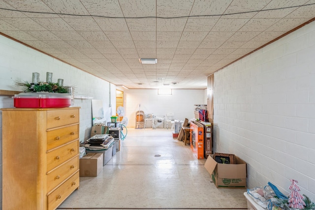 613 9th St NW, Faribault, MN 55021 - finished below grade area featuring concrete block wall and tile patterned floors