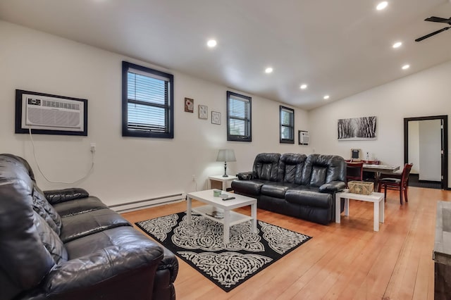 324 Douglas St, Chetek, WI 54728 - living room featuring a baseboard heating unit, a wall unit AC, light wood-style flooring, recessed lighting, and ceiling fan