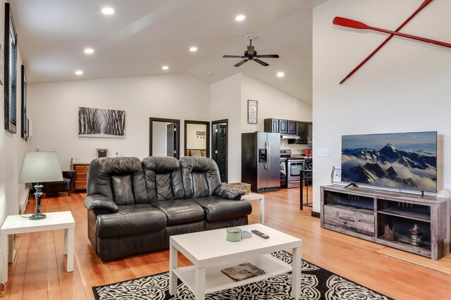 324 Douglas St, Chetek, WI 54728 - living room with light wood-style flooring, a ceiling fan, high vaulted ceiling, and recessed lighting
