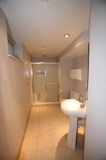 5030 Sheridan Ave S, Minneapolis, MN 55410 - full bath with tile patterned floors, a shower stall, and recessed lighting