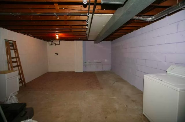 5030 Sheridan Ave S, Minneapolis, MN 55410 - unfinished basement featuring washer / dryer and concrete block wall