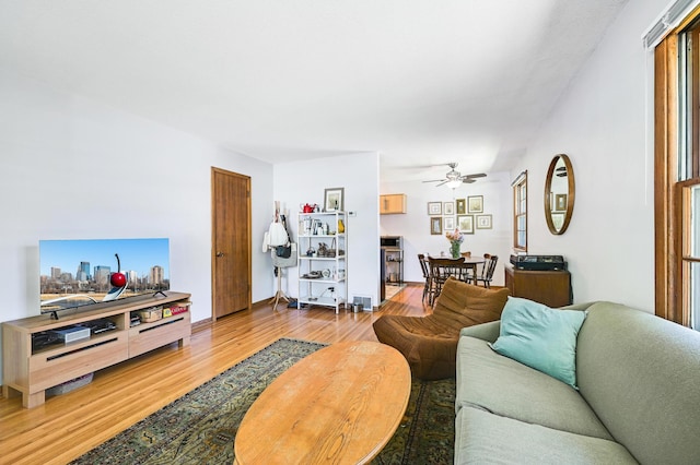 5030 Sheridan Ave S, Minneapolis, MN 55410 - living room featuring light wood finished floors and a ceiling fan