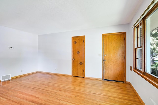 5030 Sheridan Ave S, Minneapolis, MN 55410 - empty room with light wood-style flooring and baseboards