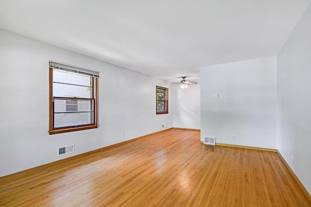 5030 Sheridan Ave S, Minneapolis, MN 55410 - unfurnished room featuring ceiling fan and light wood-type flooring