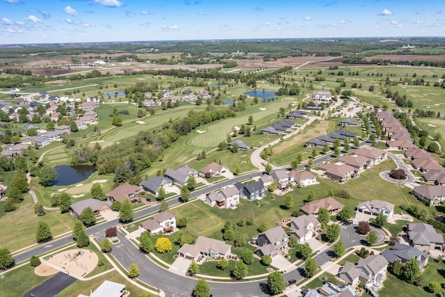 1121 Maplebeck Enclave NE, Byron, MN 55920 - aerial view of property and surrounding area with a nearby body of water, a golf course, and nearby suburban area