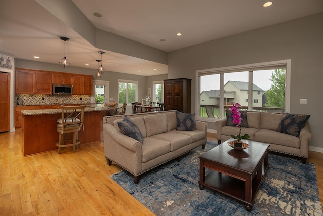 1121 Maplebeck Enclave NE, Byron, MN 55920 - living room featuring recessed lighting and light wood-style flooring