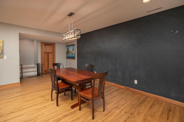 1121 Maplebeck Enclave NE, Byron, MN 55920 - dining room with baseboards, light wood-type flooring, a chandelier, and recessed lighting