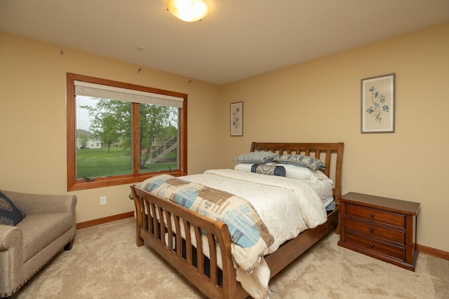 1121 Maplebeck Enclave NE, Byron, MN 55920 - bedroom with carpet and baseboards