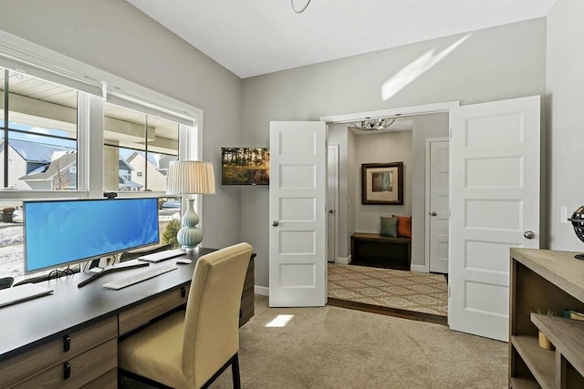 11686 32nd St N, Lake Elmo, MN 55042 - office space featuring light colored carpet, baseboards, and a chandelier