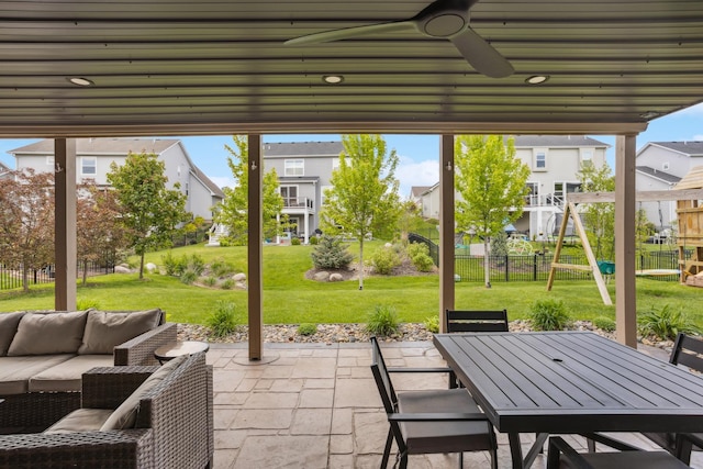 11686 32nd St N, Lake Elmo, MN 55042 - view of patio featuring outdoor lounge area, a ceiling fan, outdoor dining space, a playground, and a residential view