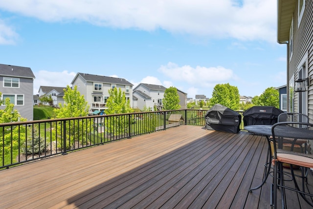 11686 32nd St N, Lake Elmo, MN 55042 - wooden deck featuring a residential view and grilling area
