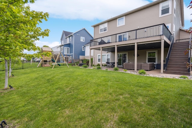 11686 32nd St N, Lake Elmo, MN 55042 - back of house featuring an outdoor living space, stairway, a playground, a patio, and a wooden deck