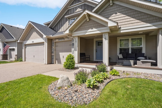 11686 32nd St N, Lake Elmo, MN 55042 - view of front of house featuring board and batten siding, a garage, asphalt driveway, a porch, and a front lawn