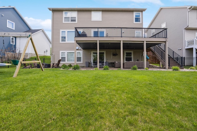 11686 32nd St N, Lake Elmo, MN 55042 - rear view of house featuring a patio, a deck, stairway, and an outdoor hangout area